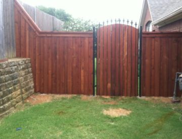 wood fence iron gate