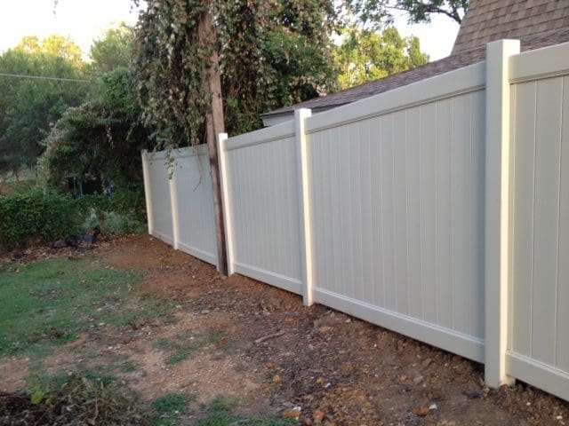 white vinyl fence