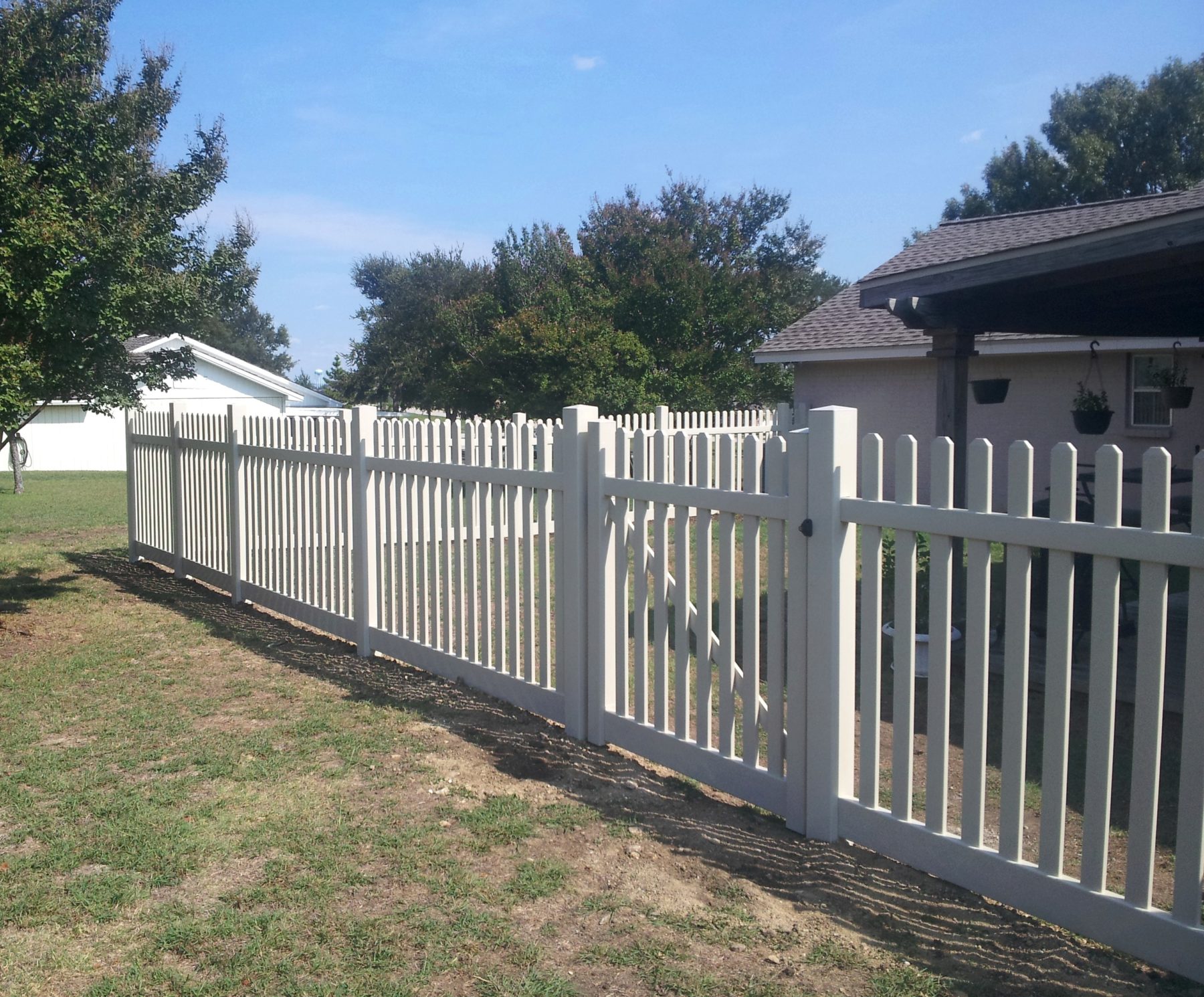 Durable Vinyl Fence Options Installed by Buzz Custom Fence